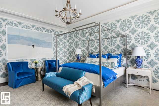 Rich blues are synonymous with royalty and elegance, making this master bedroom, with its bold use of cobalt, fit for a queen.
