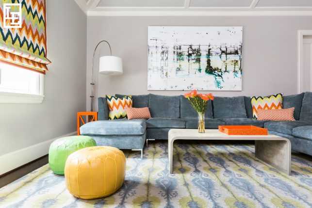 Pops of bright orange, yellow and lime green give vibrancy to this client’s cheerful play room.