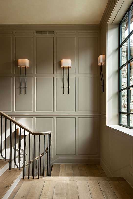 Custom made wall sconces for the staircase.